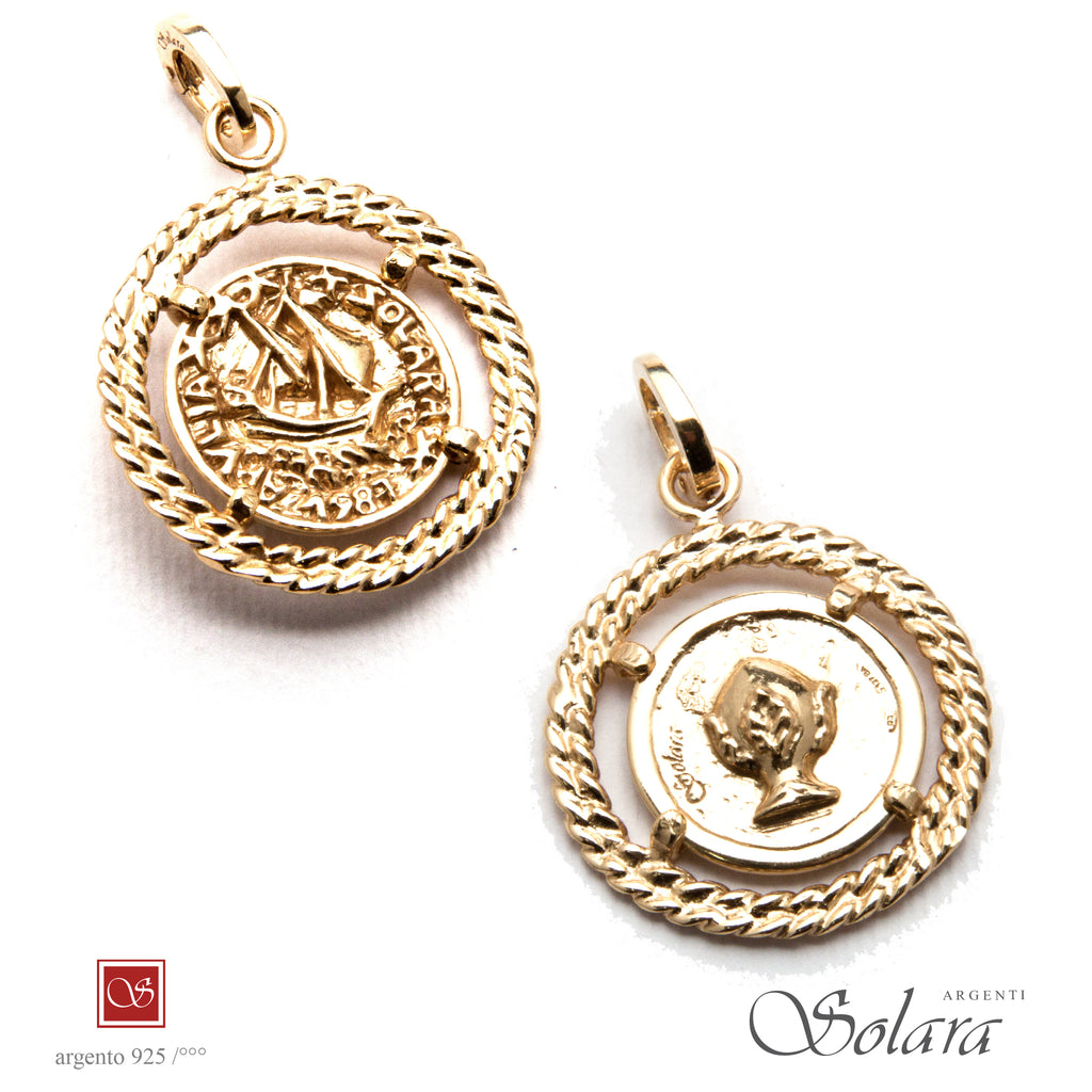 Medaglia dorata - Pomidèfiure e Caravella con ghiera