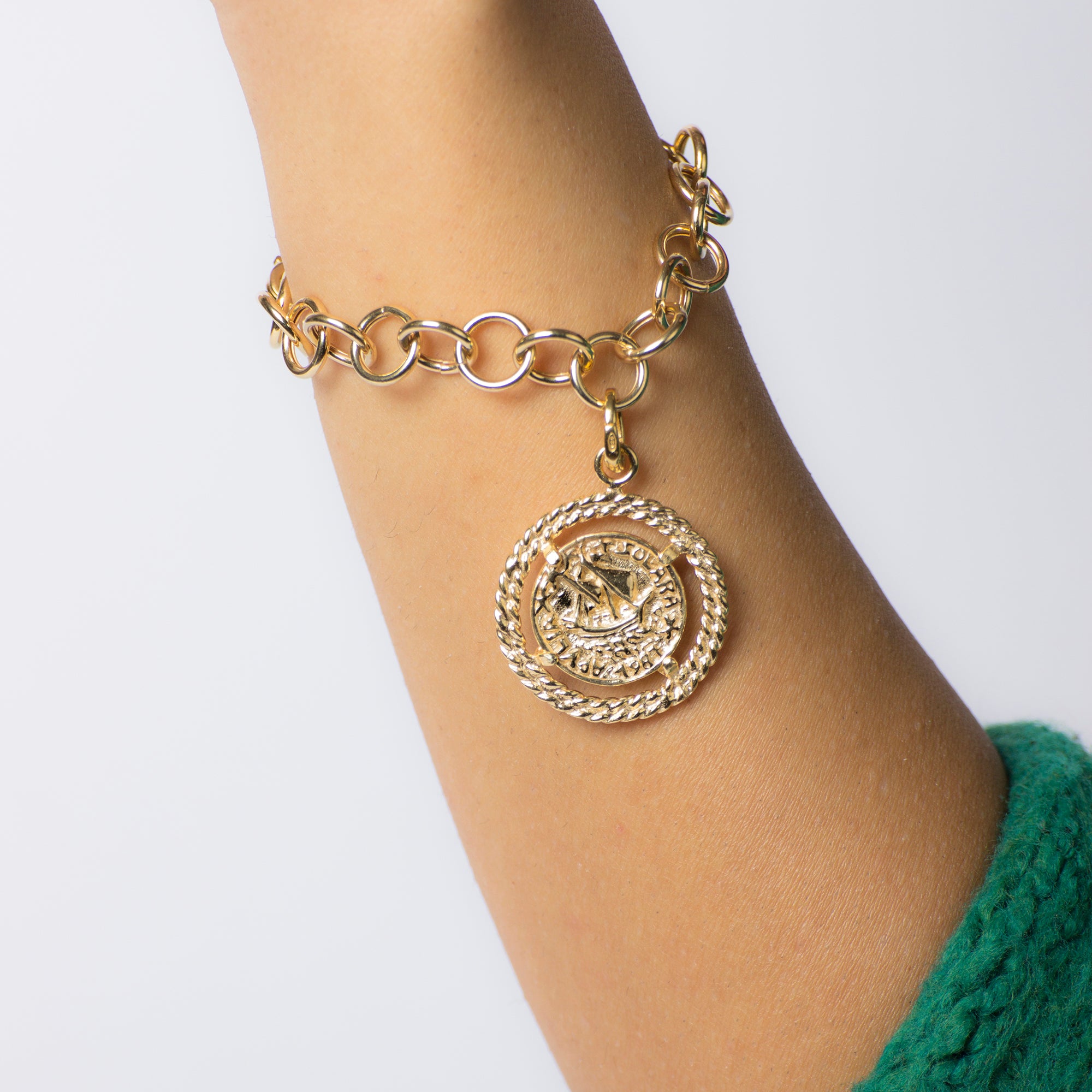 Medaglia dorata - Pomidèfiure e Caravella con ghiera